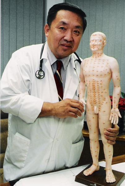 Dr-Aung-and-acupuncture-doll